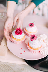 delicious cake and cupcakes in a beautiful decor makes pastry chef