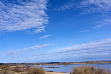 Beautiful natural scenery of river in southeast Asia tropical green forest with mountains in background, aerial view drone shot .