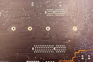 Work in progress. Soldering of electronic circuit board with components. Engineers repair circuit...