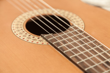 acoustic guitar with nylon strings. Close-up background