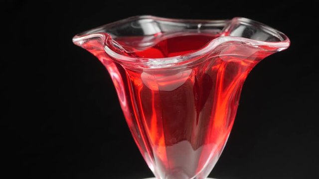 Tasty red jelly in bowl. red substance in a glass bowl