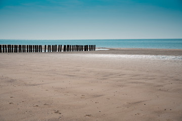 north sea coastline of Burgh Haamstede with breakwaters, The Netherlands