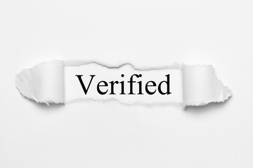 Verified on white torn paper