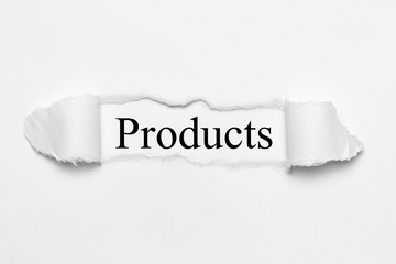 Products on white torn paper