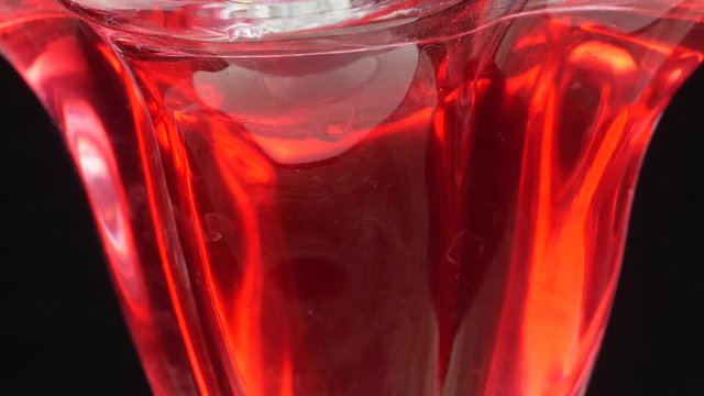 Tasty red jelly in bowl. red substance in a glass bowl