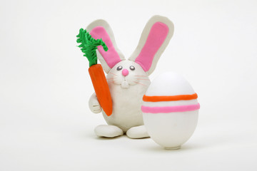 Plasticine rabbit with easter eggs.