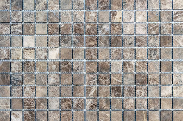 Mosaic tiles in the interior of the bathroom. Background of a ceramic mosaic tile.