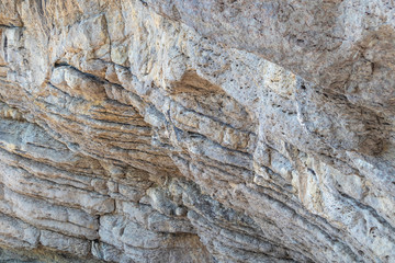 Abstract texture of the stone cliff surface
