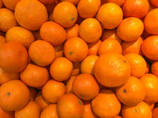 A lot of fresh mandarin oranges texture.