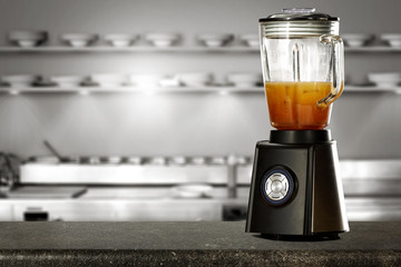 Blender on desk and free space for your decoration