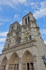 Fototapeta na wymiar PARIS, FRANCE -6 OCT 2018- View of the Notre Dame de Paris cathedral on the Ile de la Cite on the River Seine in the center of Paris before it was damaged by a fire in April 2019.