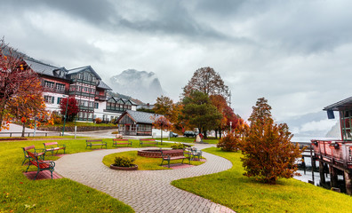 The lakeshore promenade in Grundlsee and of the Mountain Backenstein on background.