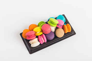 Fototapeta na wymiar Colorful of Macarons on white background close up