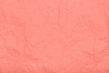 Abstract textured paper coral color background.