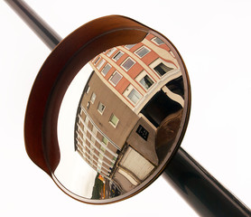 buildings reflected in a mirror