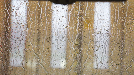 16296_Water_dripping_on_the_mirror_of_the_car.jpg