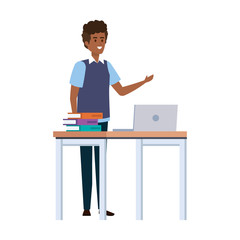 young black teacher in desk with laptop and books