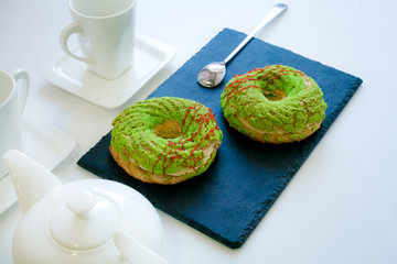 Paris Brest cake on black Board isolated on white background