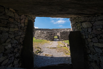 View to the Cahergall Stone Fort the the entrance gate. Cahersiveen. Co. Kerry, Ireland. April 2019