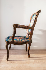 Renovation of old furniture as an antique Victorian old wooden armchair.