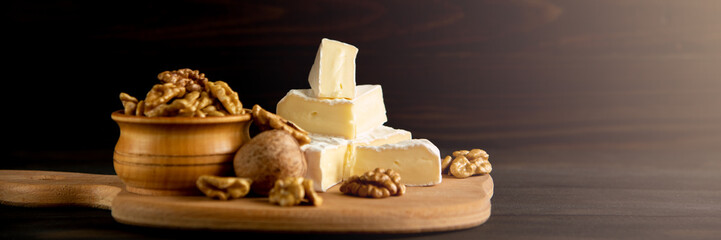 Cheese camembert or brie with walnut kernels