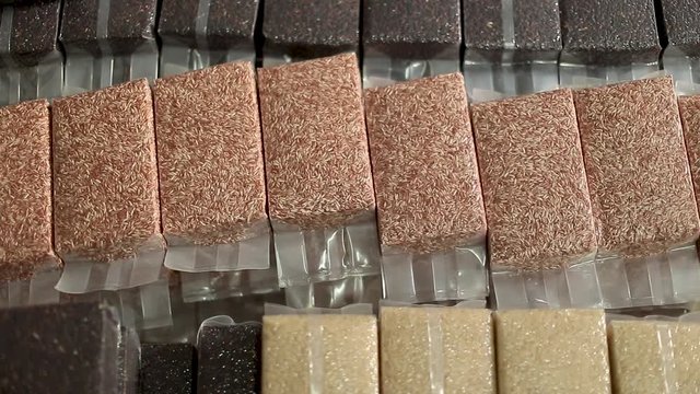 The different kinds of rice pack in the clear packaging to show theirs colors.
