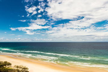 Fototapeta na wymiar Landscape of the sea, blue sky, sandy beach in the Gold Coast Australia