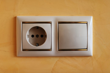 Many types of electrical outlets, switches, internet and tv outlets within and within different scenery and premises.