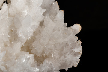 Macro stone Calcite mineral on a black background