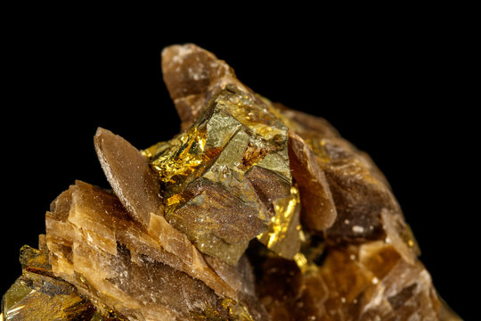 Macro siderite mineral stone on black background