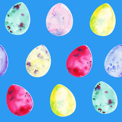 Blue seamless pattern with hand drawn watercolor Easter eggs decorated with abstract splatters resembling moon surface