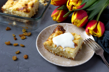 Cottage cheese casserole with raisins for breakfast.