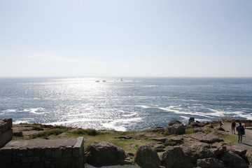 Ocean view to the blue horizon at a cliff in England's Land's End. Cornwall, UK