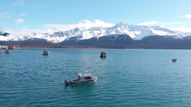 Small charter boats taking tourists out to see the wildlife and scenery of Alaska 