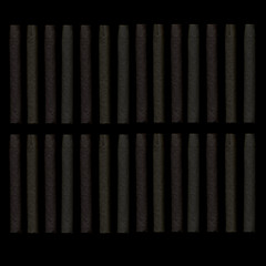 Cigars on a dark background. Cigars in the dark. Background of evenly spaced cigars. - 262571731