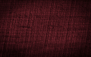 Texture of dark burgundy old rough wood. Mahogany abstract background for design. Vintage retro