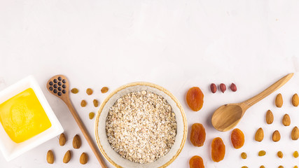 Ingredients for making tasty and healthy oatmeal for breakfast
