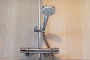 Sanitary fittings for bathrooms, faucets, shower cubicles, water taps, ceramic tiles and mosaics.