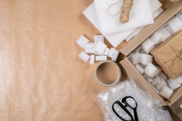 Packing products for delivery, shipping service. Delivery concept for private companies delivery with care , Craft present box