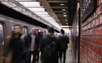 Naklejka na ściany i meble MTA Subway Station Working People Taking Train City Lifestyle