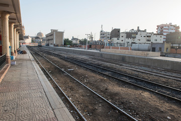 Fototapeta na wymiar Railway tracks at urban train station in Egypt