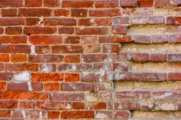 Texture of an old red brick wall.