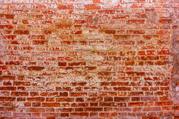Texture of an old red brick wall.