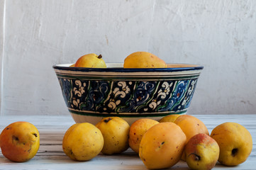 Quince in a blue bowl