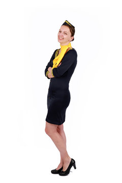  Stewardesse - Charming and smiling stewardess wearing in the blue uniform. Isolated on white background
