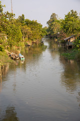Fototapeta na wymiar Village on waterfront in Mekong Delta of Vietnam