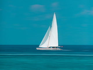 Fototapeta premium Sailboat in calm sea