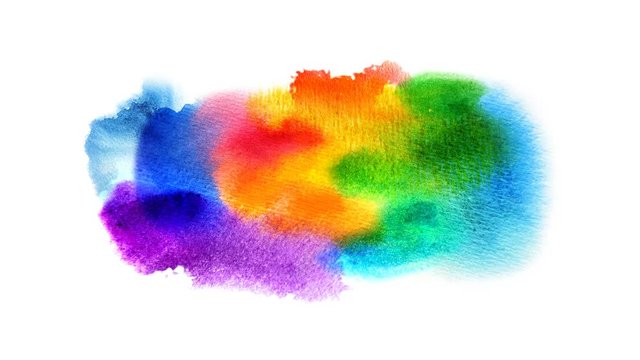 Beautiful multicolored, colorful spot appears on a white background. Bright cyan, yellow, red and orange paints spreads on paper forming a blot.