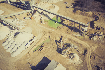 Fototapeta na wymiar Aerial view of opencast mining quarry. Industrial place view from above