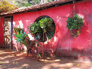 old red cottage in summer
